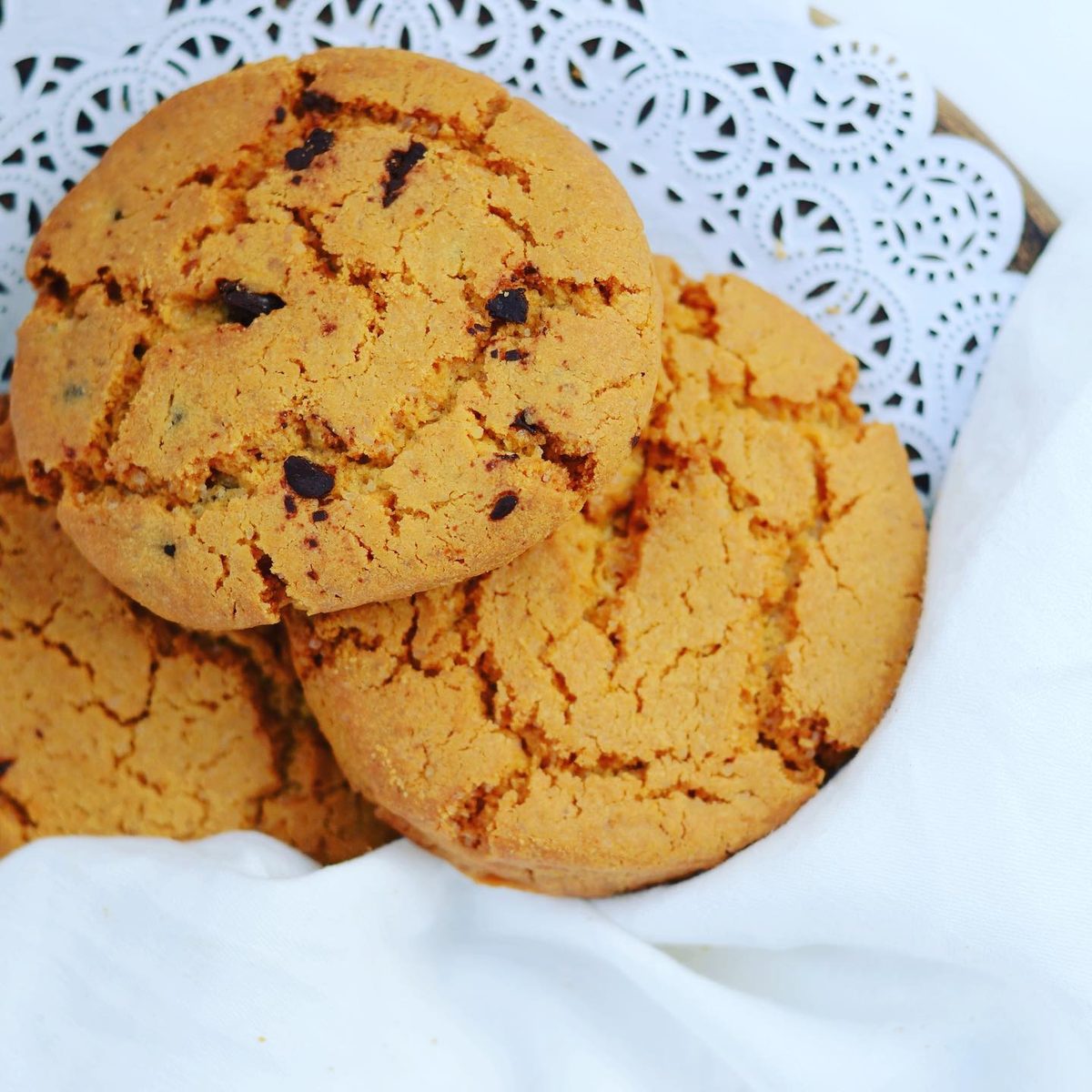 Chocolate chip cookies in a lace-lined basket